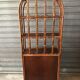 Rattan shelf with storage from the 1970s