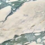 Old vintage gilded side table with marble top