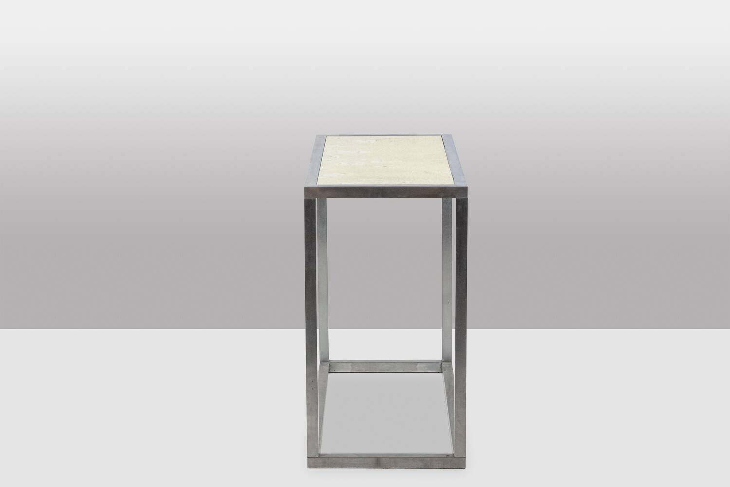 Maison Jansen. Console in brushed aluminium and verre églomisé top.