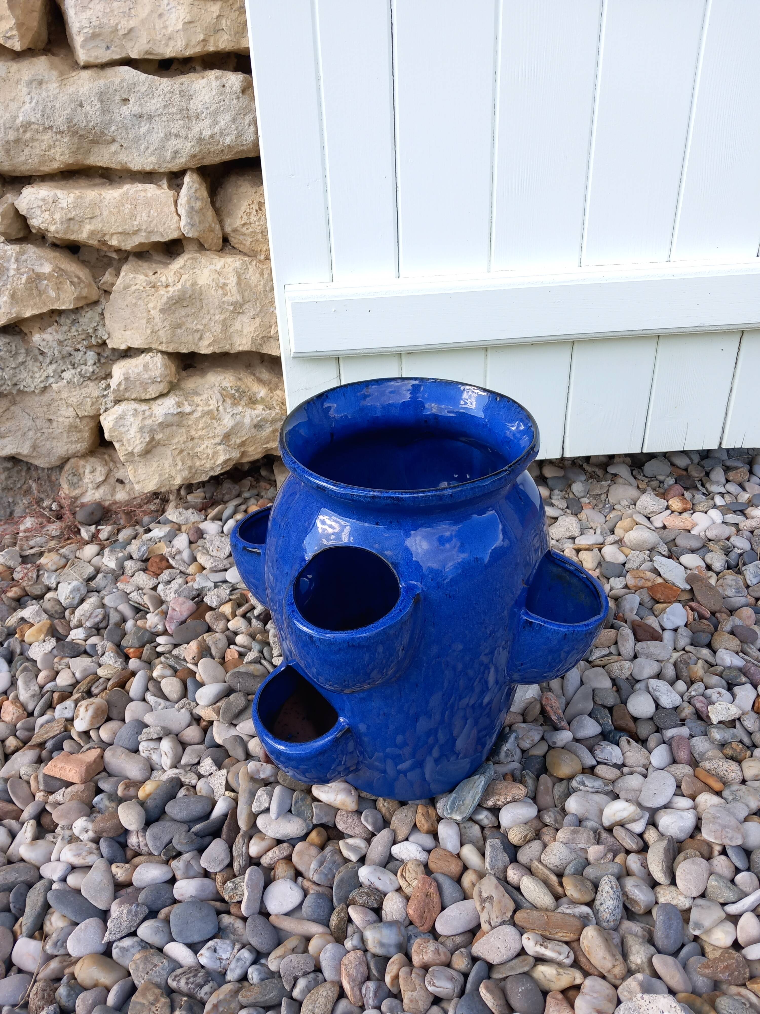 Blue glazed terracotta strawberry pot