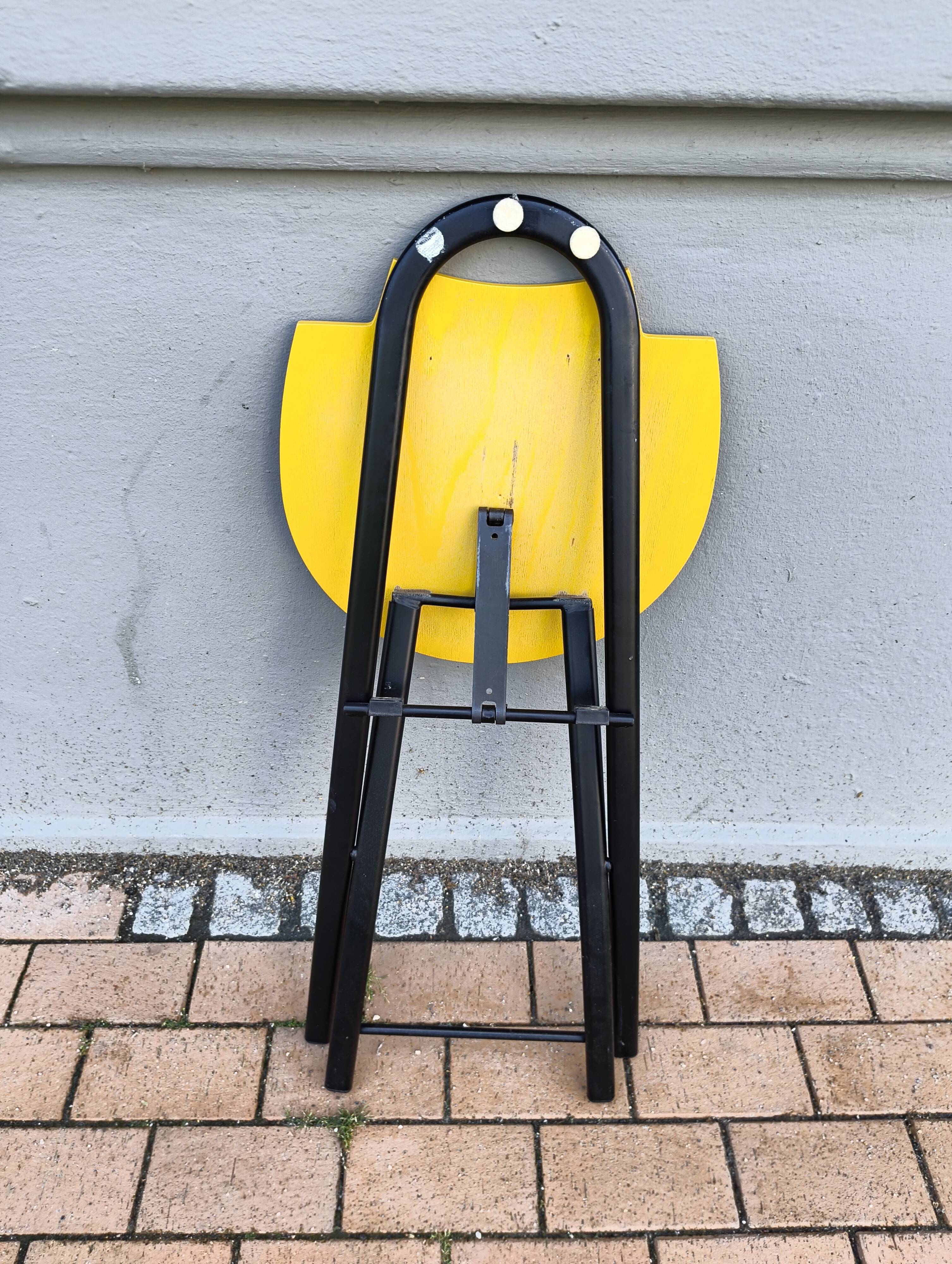 yellow folding chair
