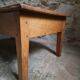 Antique French coffee table, 18th-century cherry farmhouse table with a drawer.