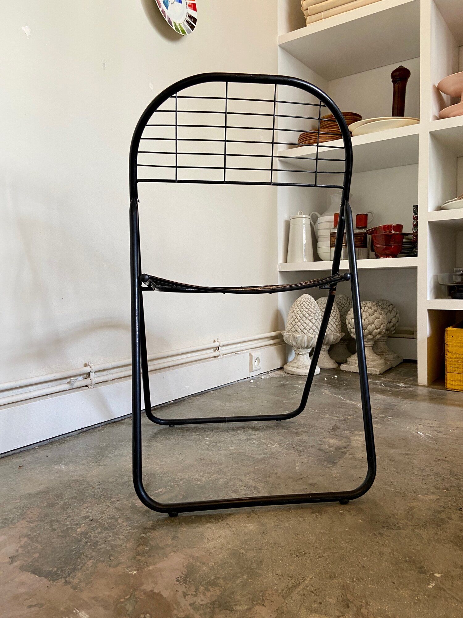 Black metal folding chair