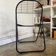 Black metal folding chair