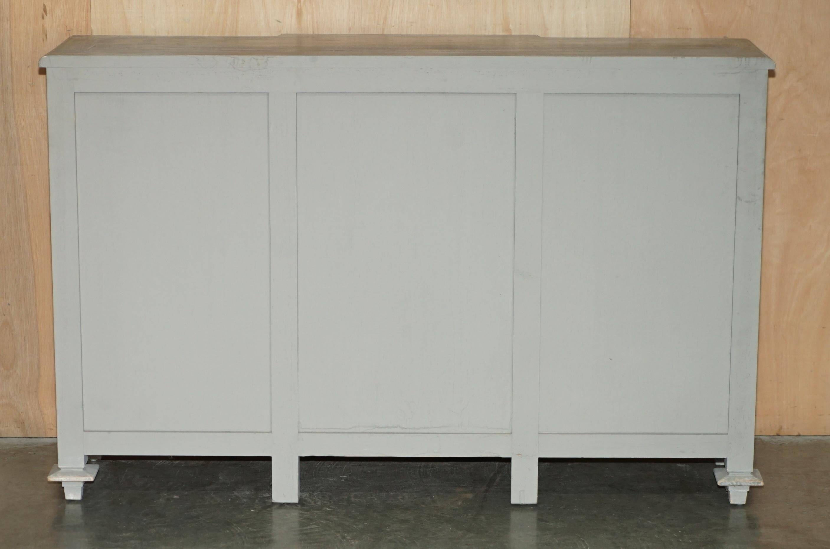 Vintage sideboard with wrought iron doors