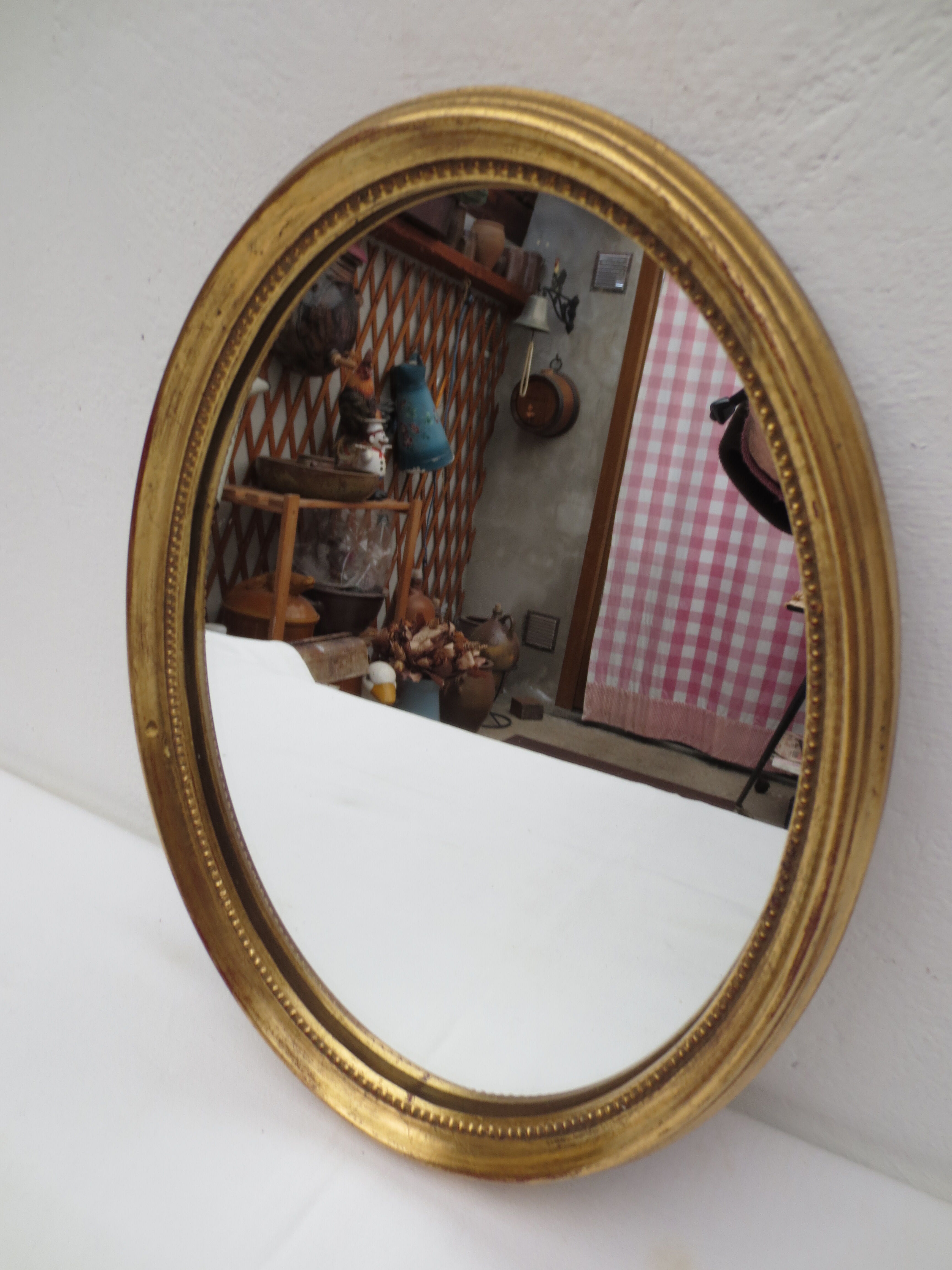 Oval wooden mirror gilded tower, medallion type