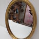 Oval wooden mirror gilded tower, medallion type