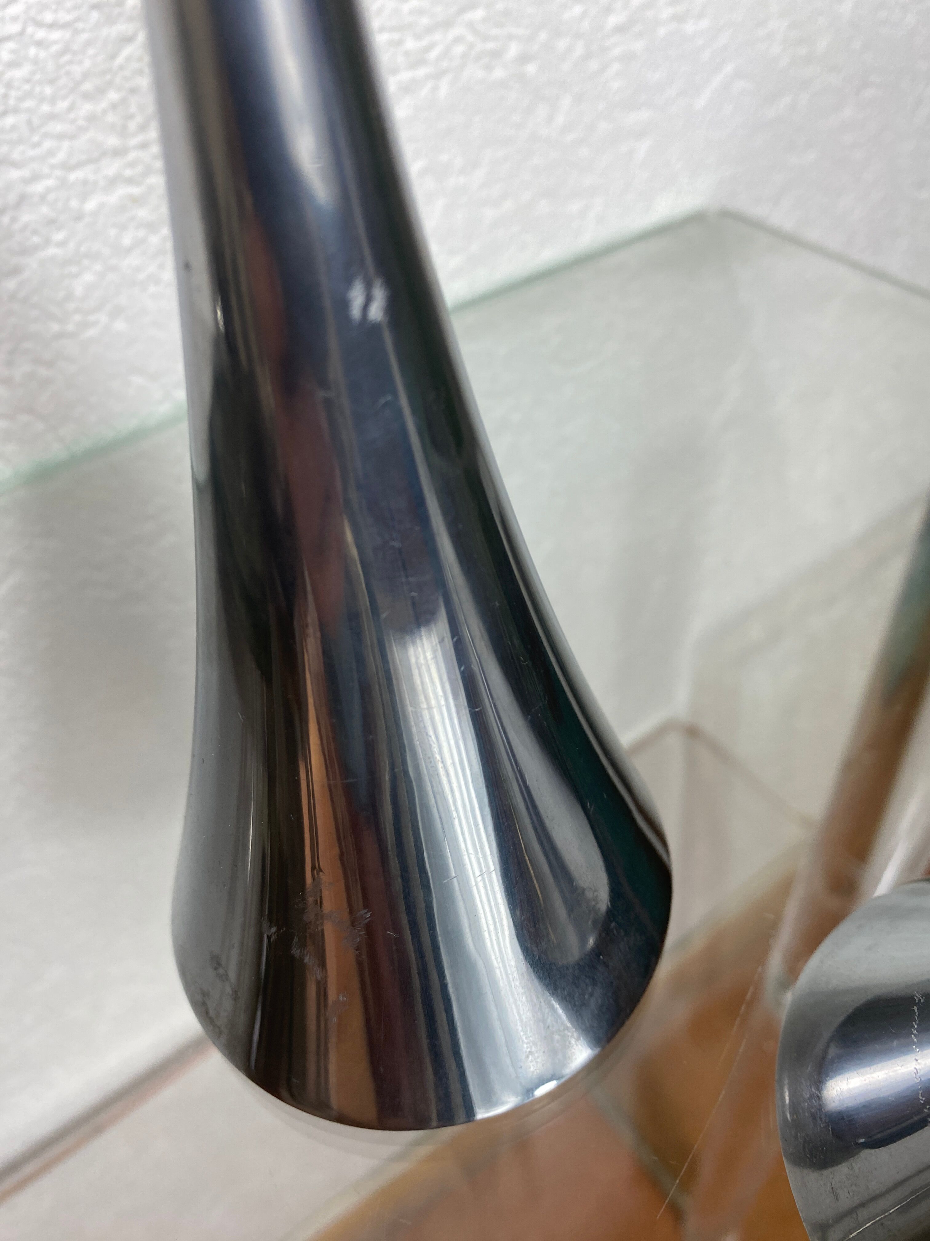 Pair of designer candle holders in stainless steel