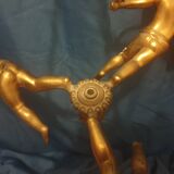 Antique chandelier decorated with cherubs and putti angels taken from the attic