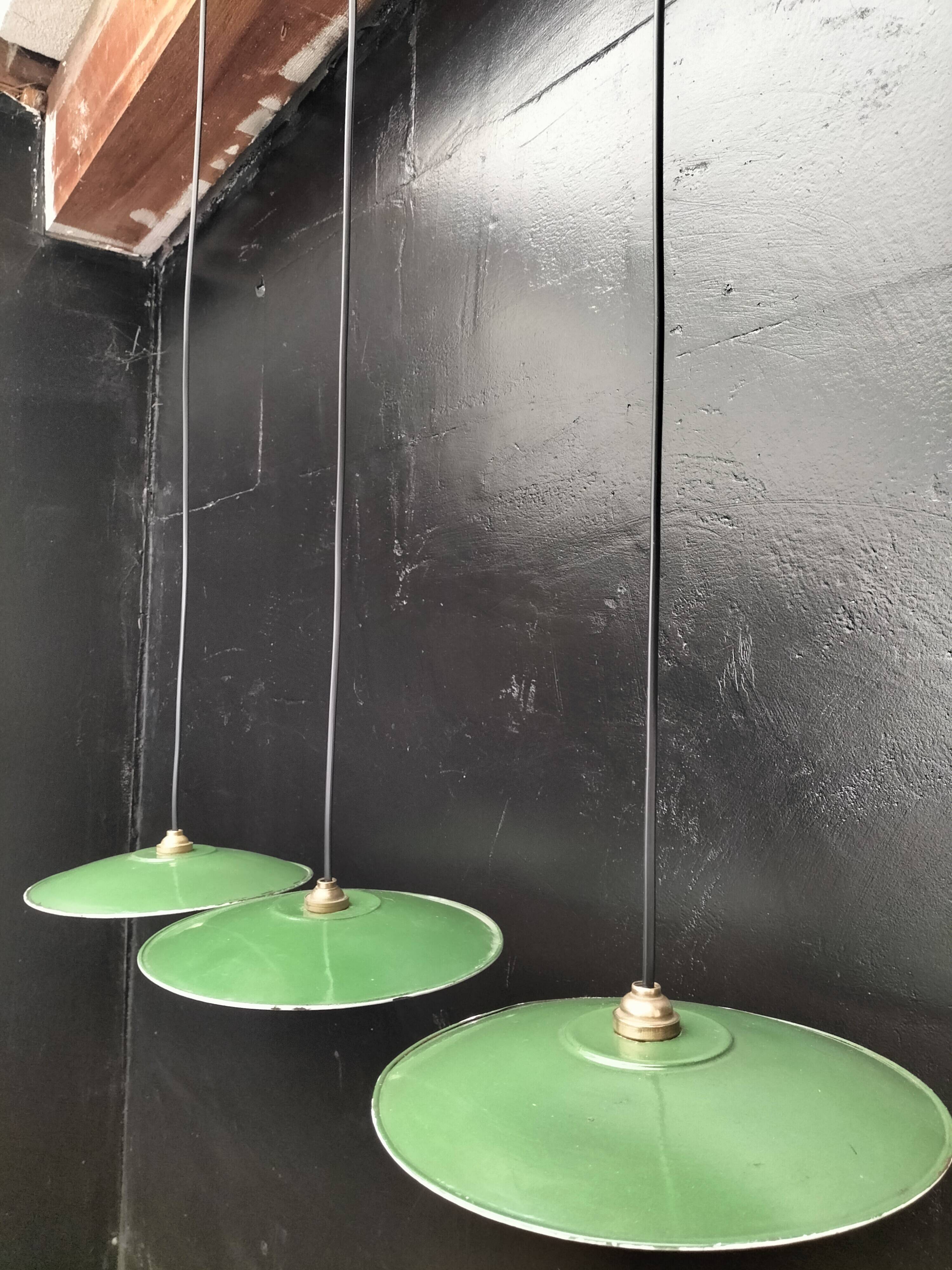 Three enamelled sheet metal suspensions