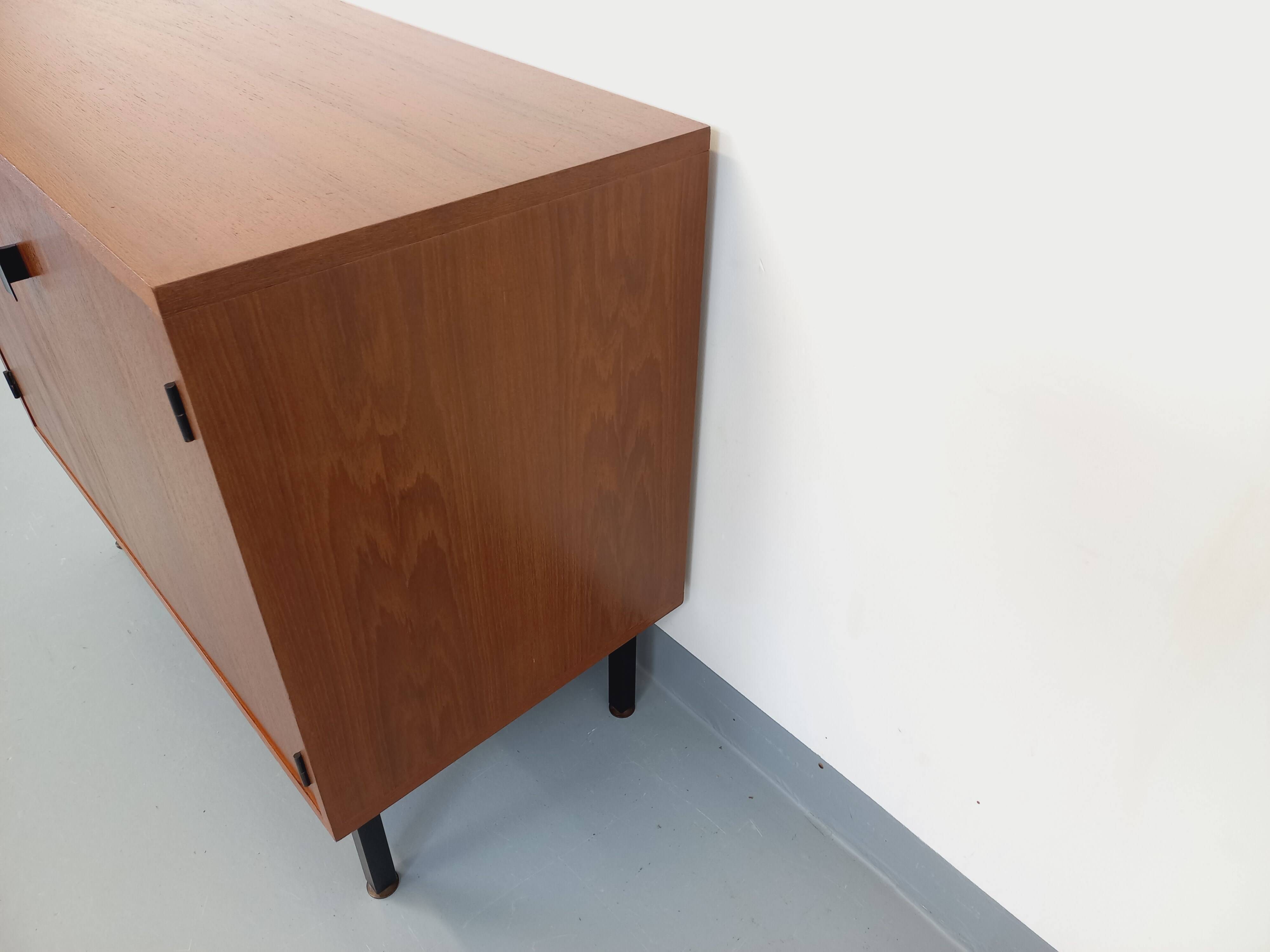 Small vintage storage unit in modernist Scandinavian style in teak from the 60s