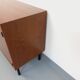 Small vintage storage unit in modernist Scandinavian style in teak from the 60s