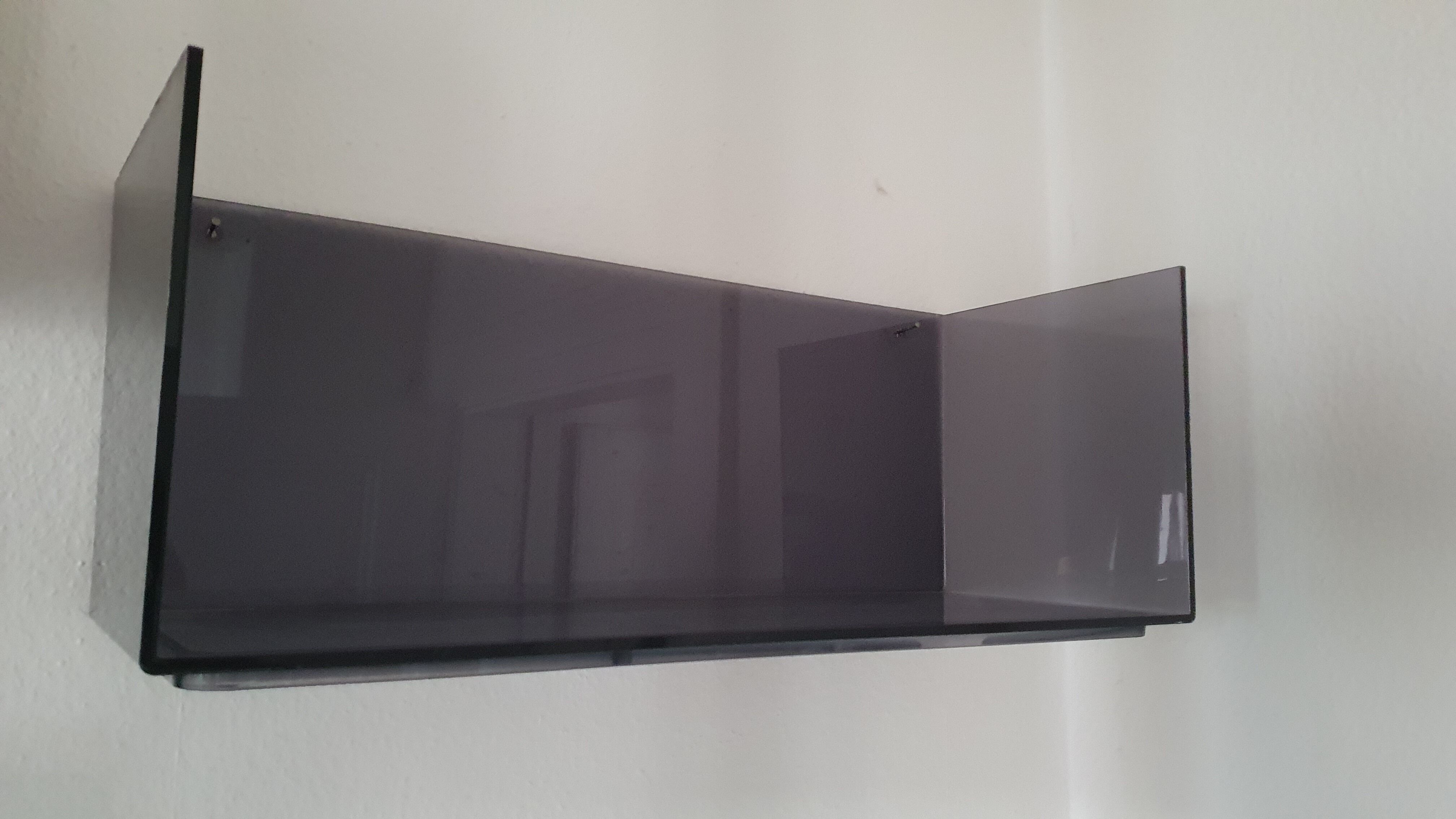 Plexiglas wall shelf