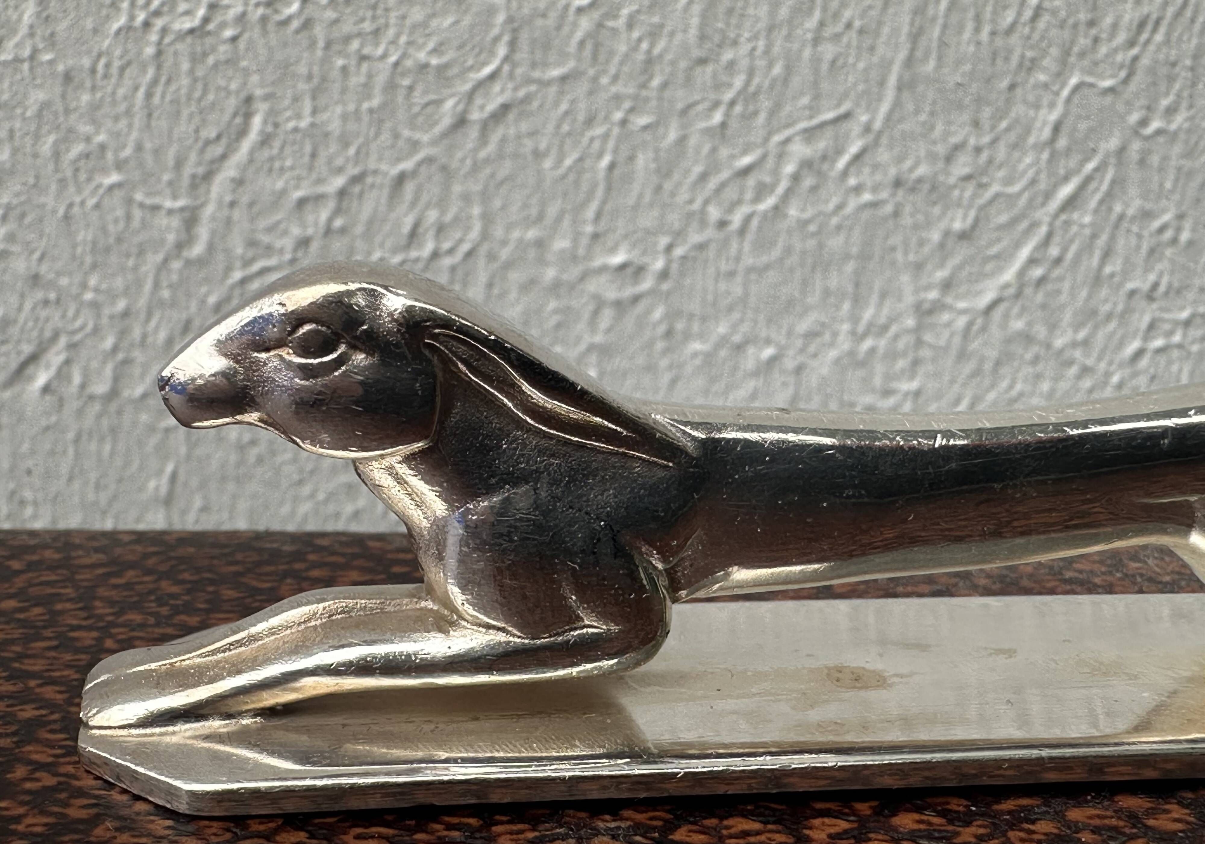 12 antique silver-plated bronze knife rests in modern art deco animal designs.