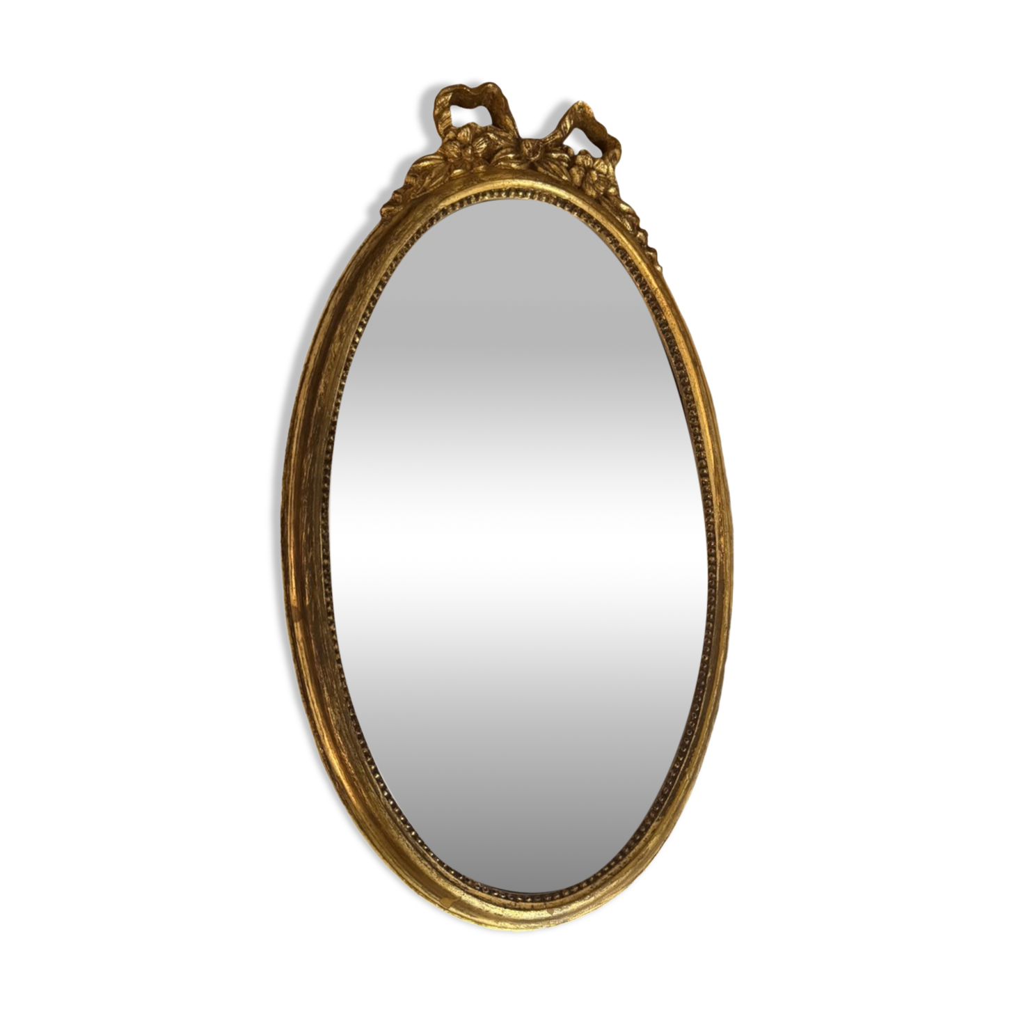 Oval gold knot mirror