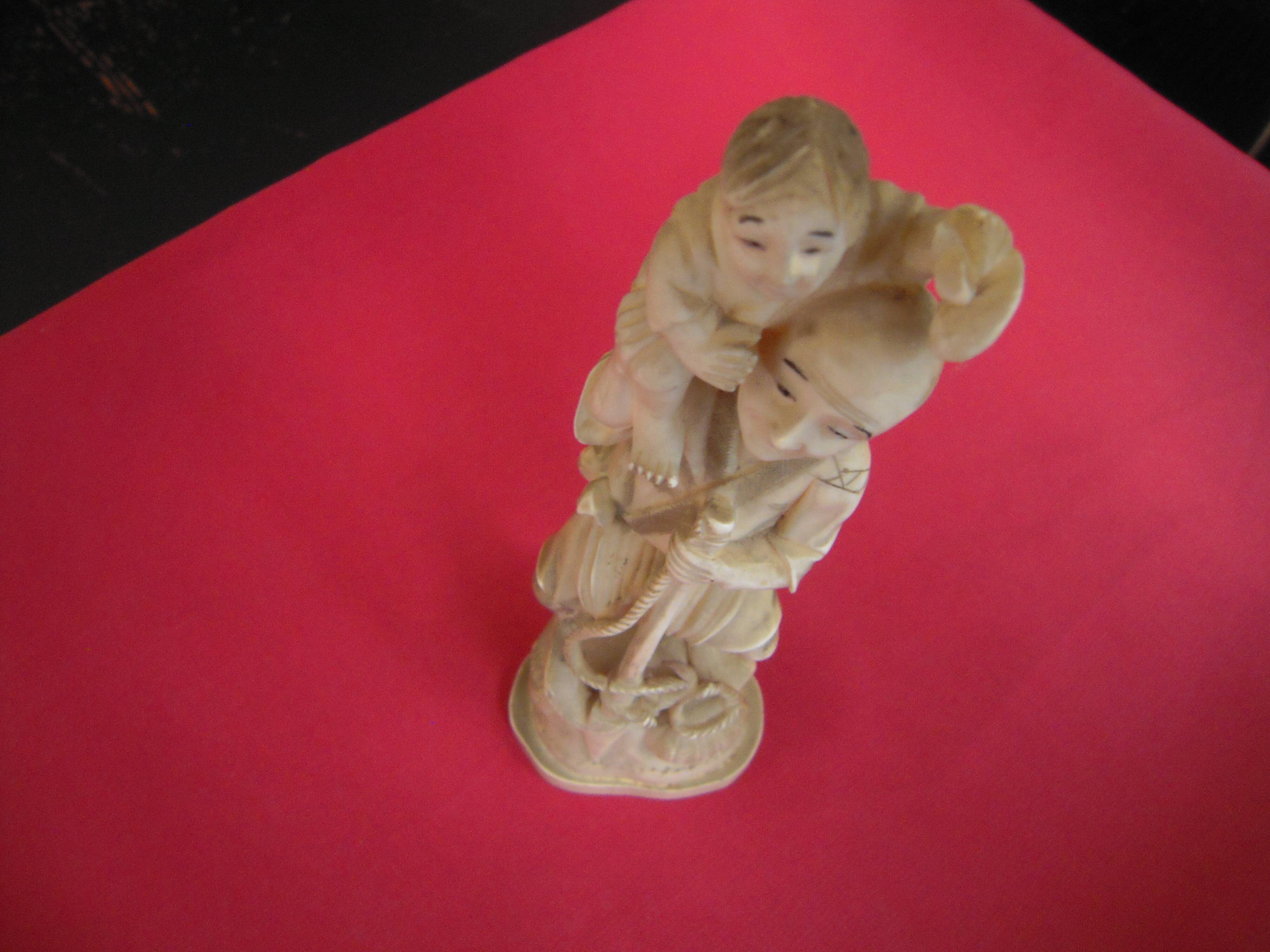 OKIMONO IN CARVED IVORY MEIJI PERIOD (1868 - 1912) FROM JAPAN.