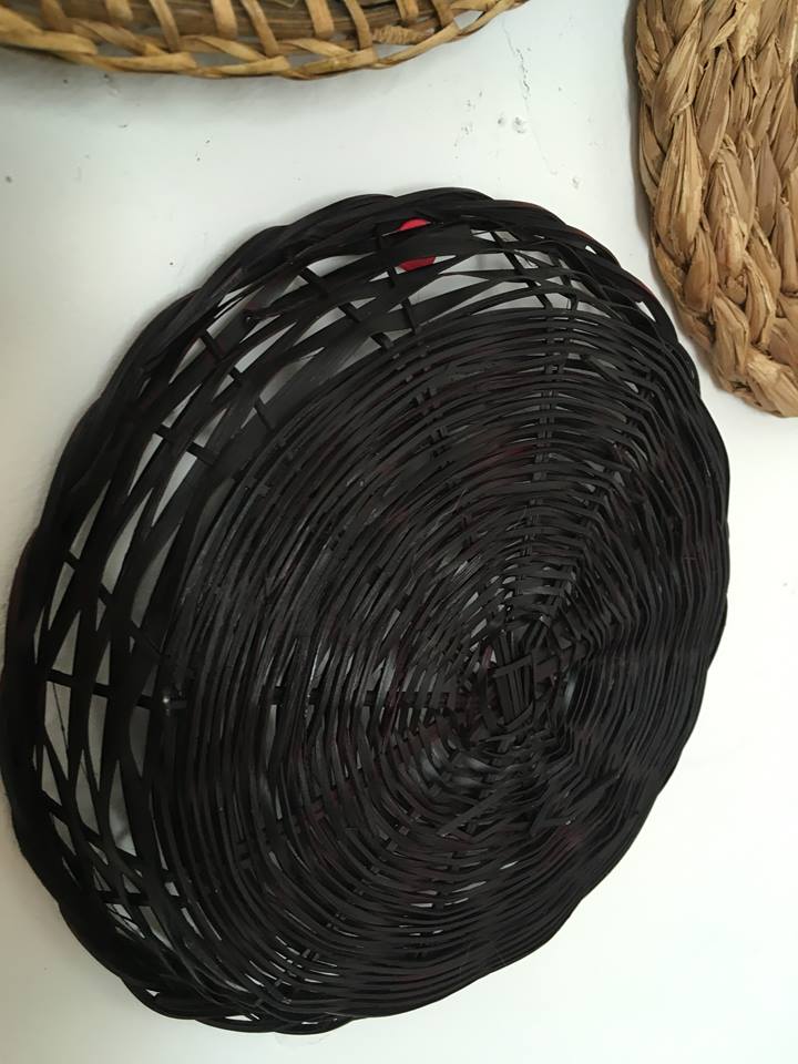 Wall composition of seven baskets and wicker trays