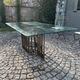Dining table with brass base in the style of Willy Rizzo, 1970s.