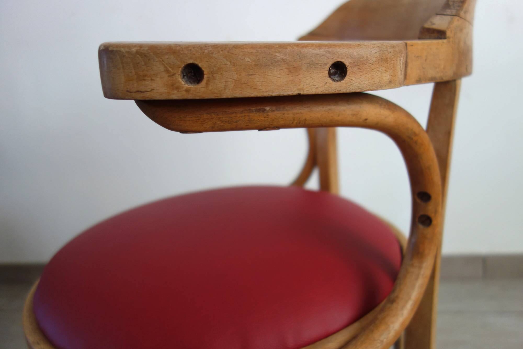 Vintage curved wooden armchair