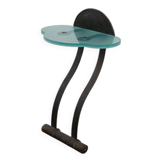 Artisanal wrought iron and cast glass leaning console table