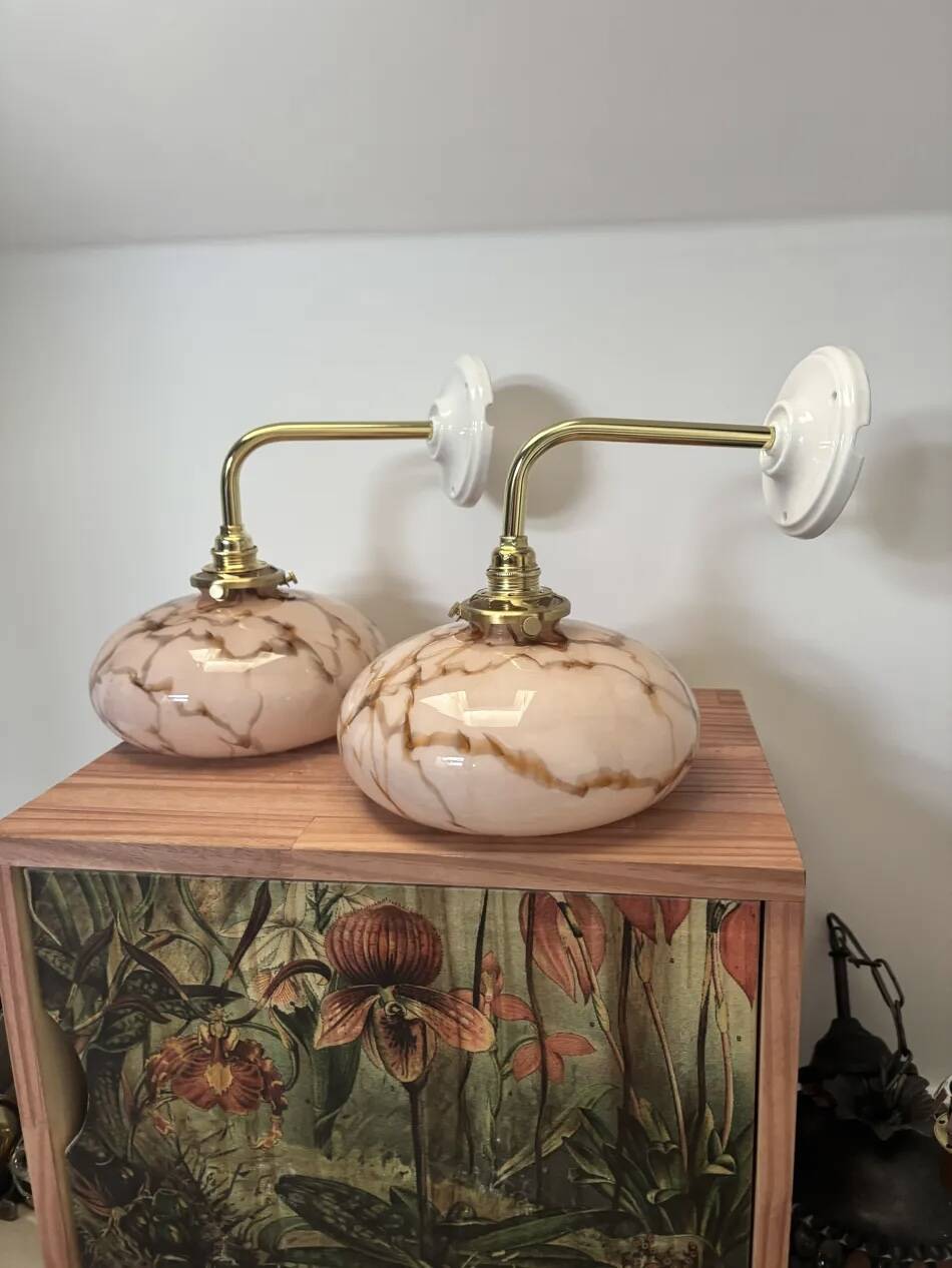 Pair of wall sconces in marbled opaline.