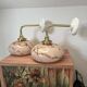 Pair of wall sconces in marbled opaline.