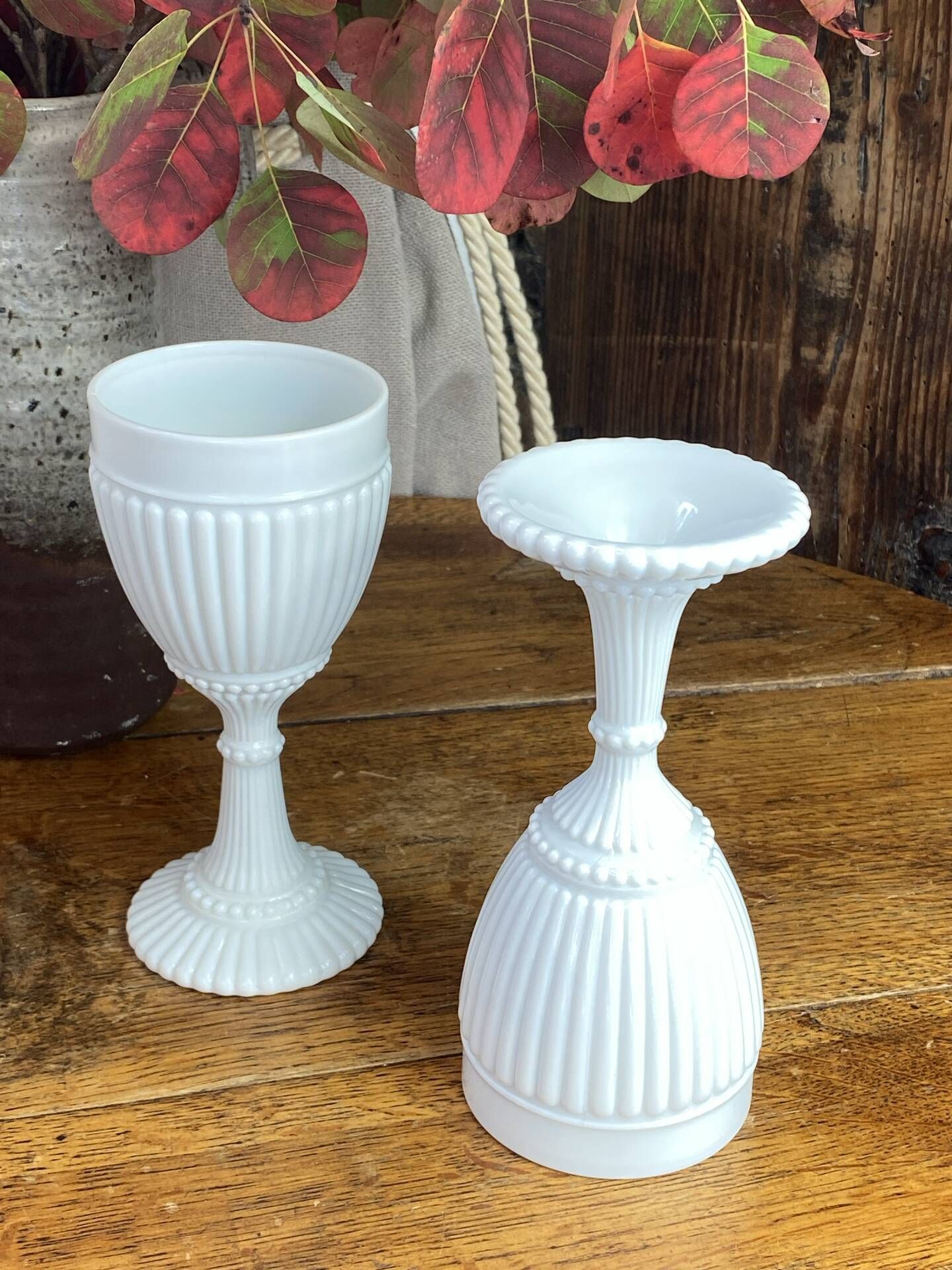 Footed glasses, white opaline chalices