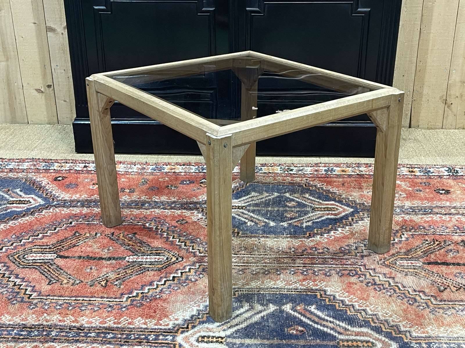 Coffee table in oak with a glass top, dating from the 1950s