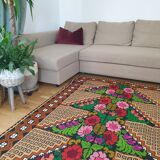 Brown wool rug with colorful boho flowers 142x196cm