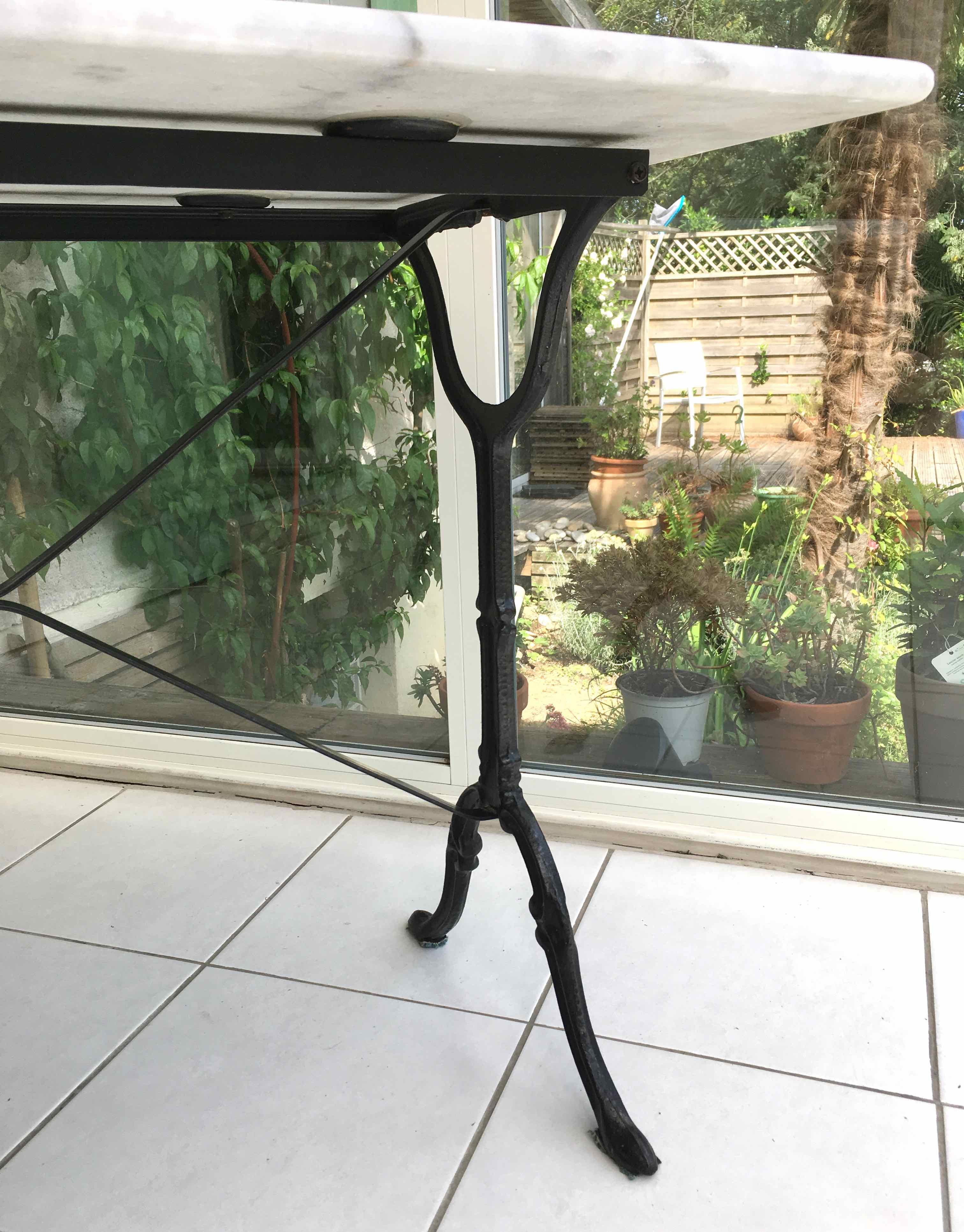 Marble and cast iron bistro table