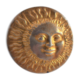 Brass sun paperweight