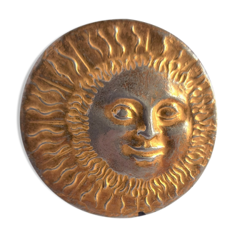 Brass sun paperweight