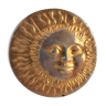 Brass sun paperweight