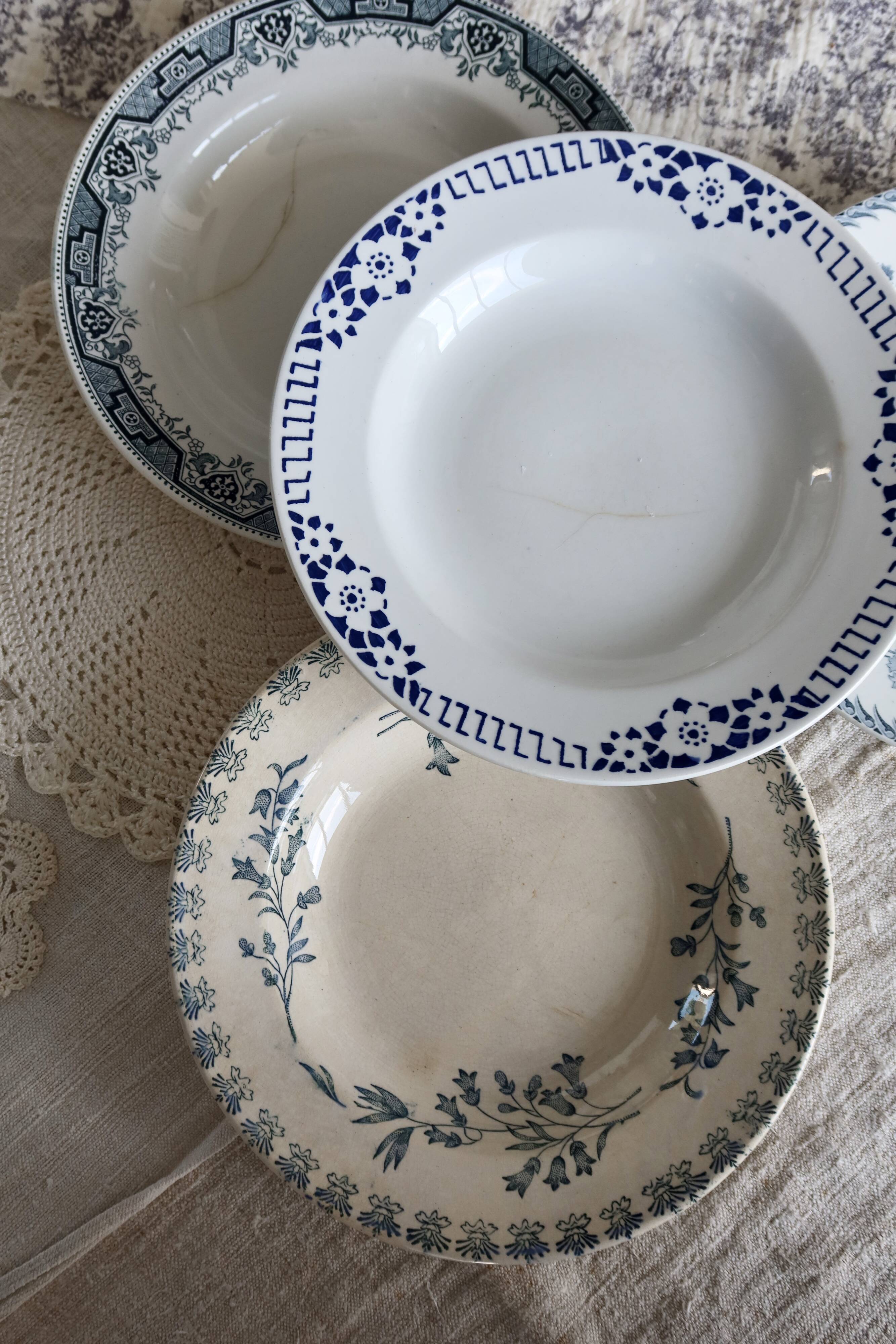 4 vintage blue ironstone soup plates