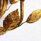 Old candlestick mirror gilded with leaf