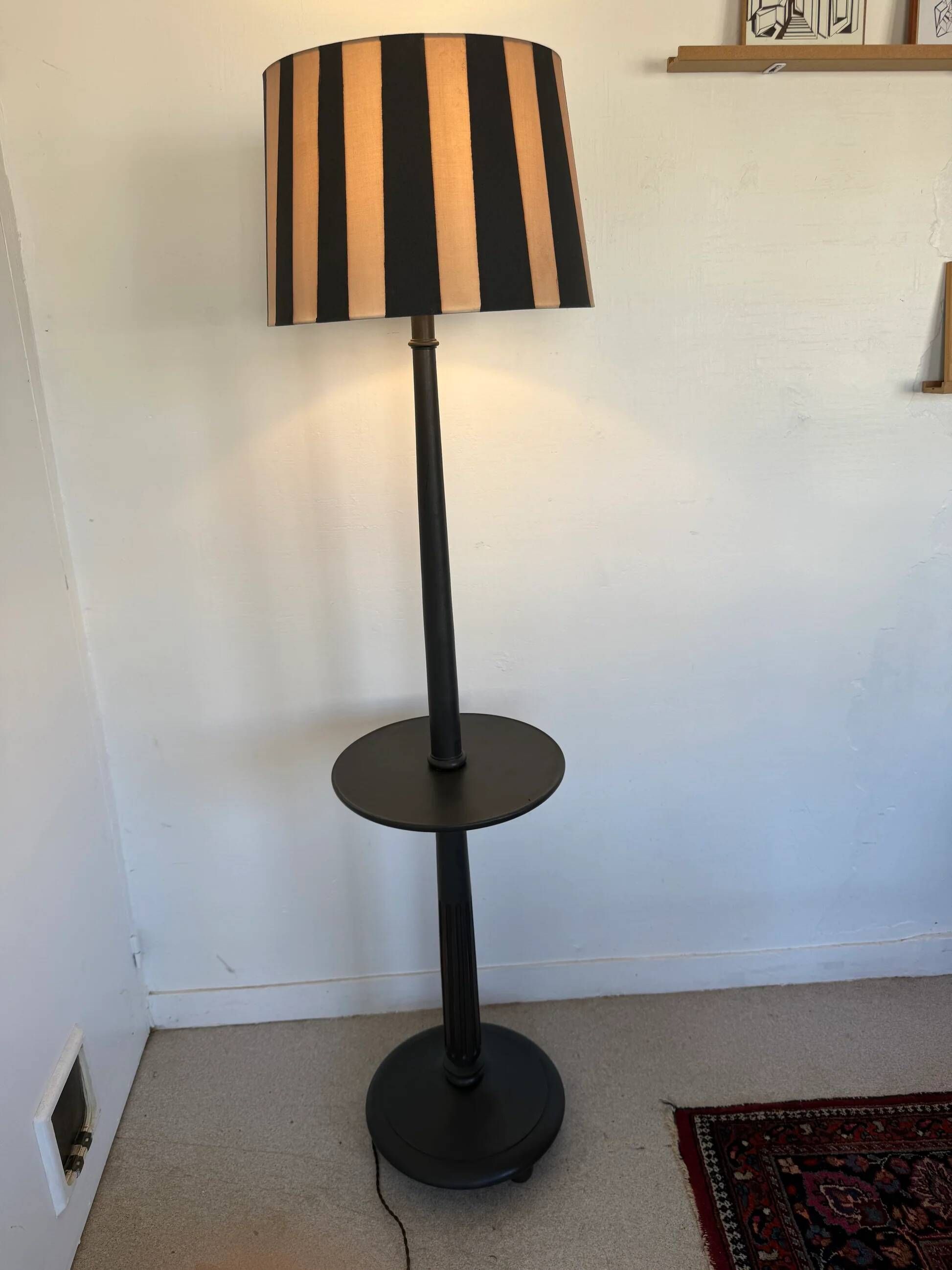 Vintage floor lamp in black patinated wood and striped lampshade