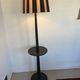 Vintage floor lamp in black patinated wood and striped lampshade
