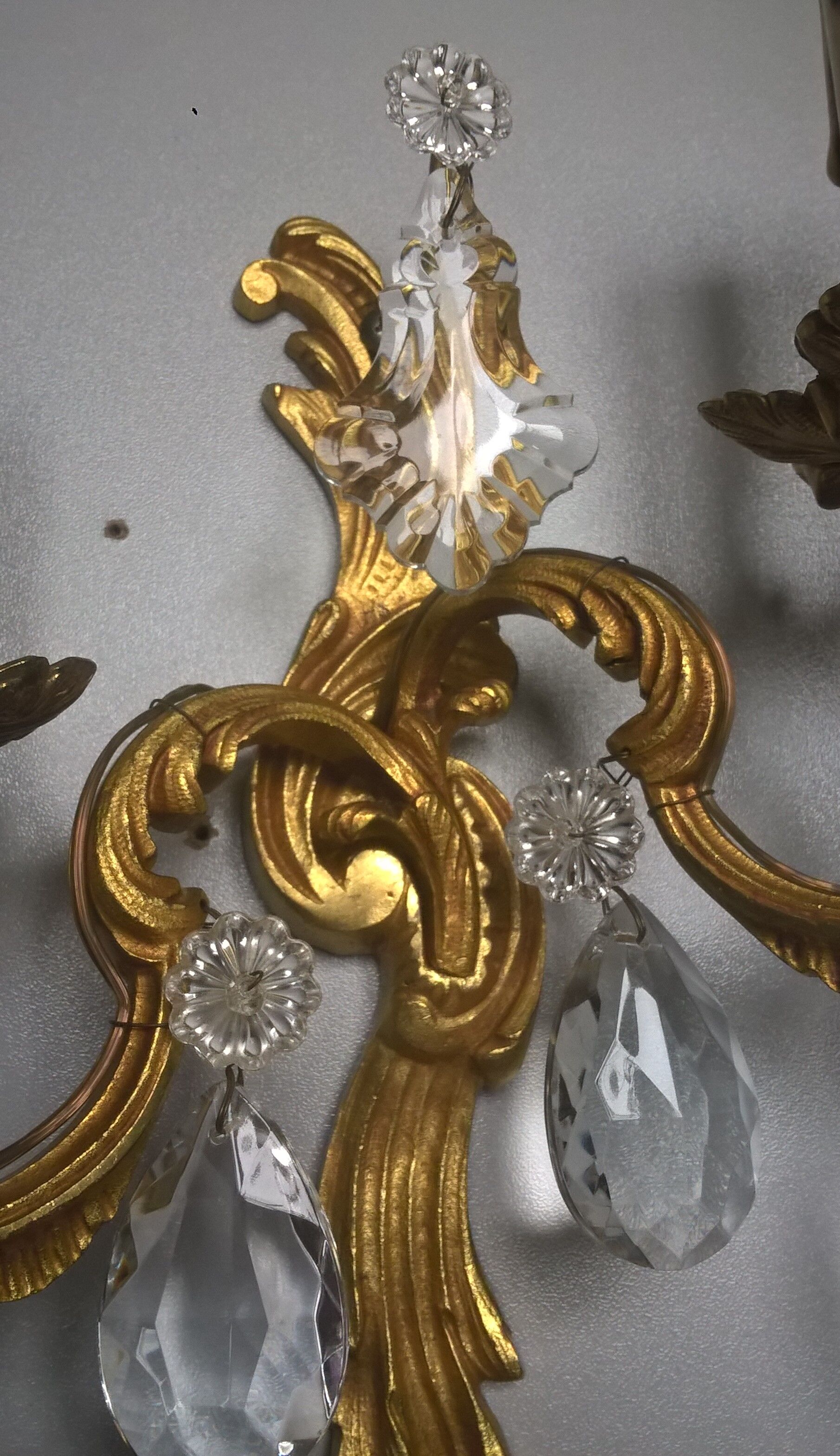 Pair of asymmetrical appliques, gilded bronze and crystal tassels, Louis XV style