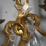 Pair of asymmetrical appliques, gilded bronze and crystal tassels, Louis XV style