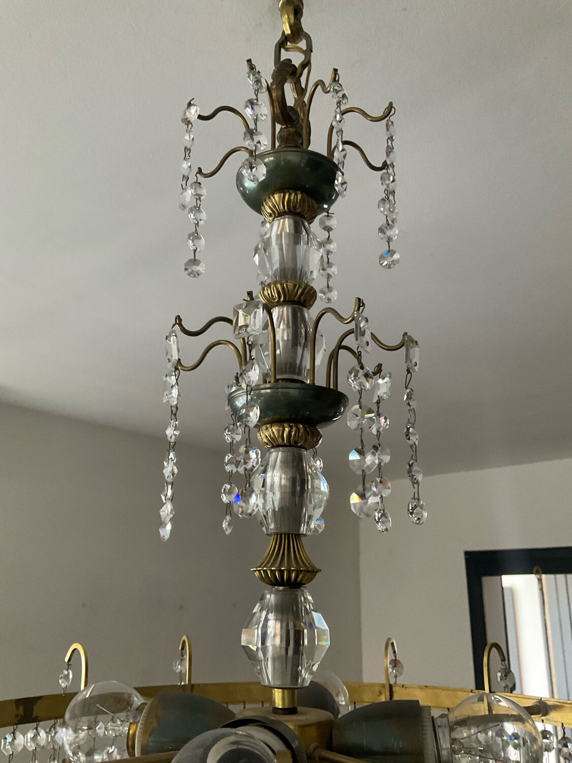 Brass chandelier with crystal pendants