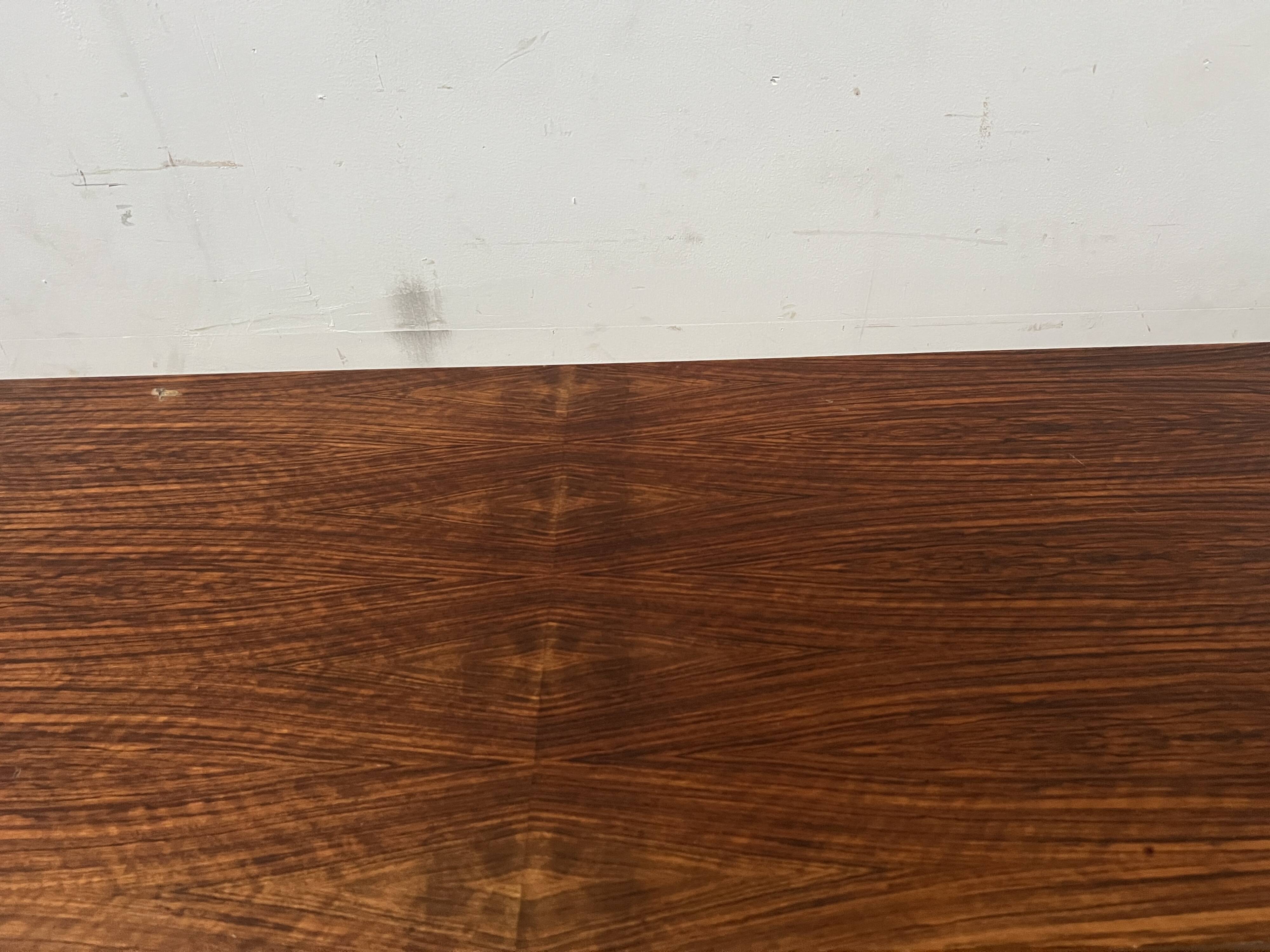 Scandinavian enfilade in veneered wood with iron legs, 20th century.