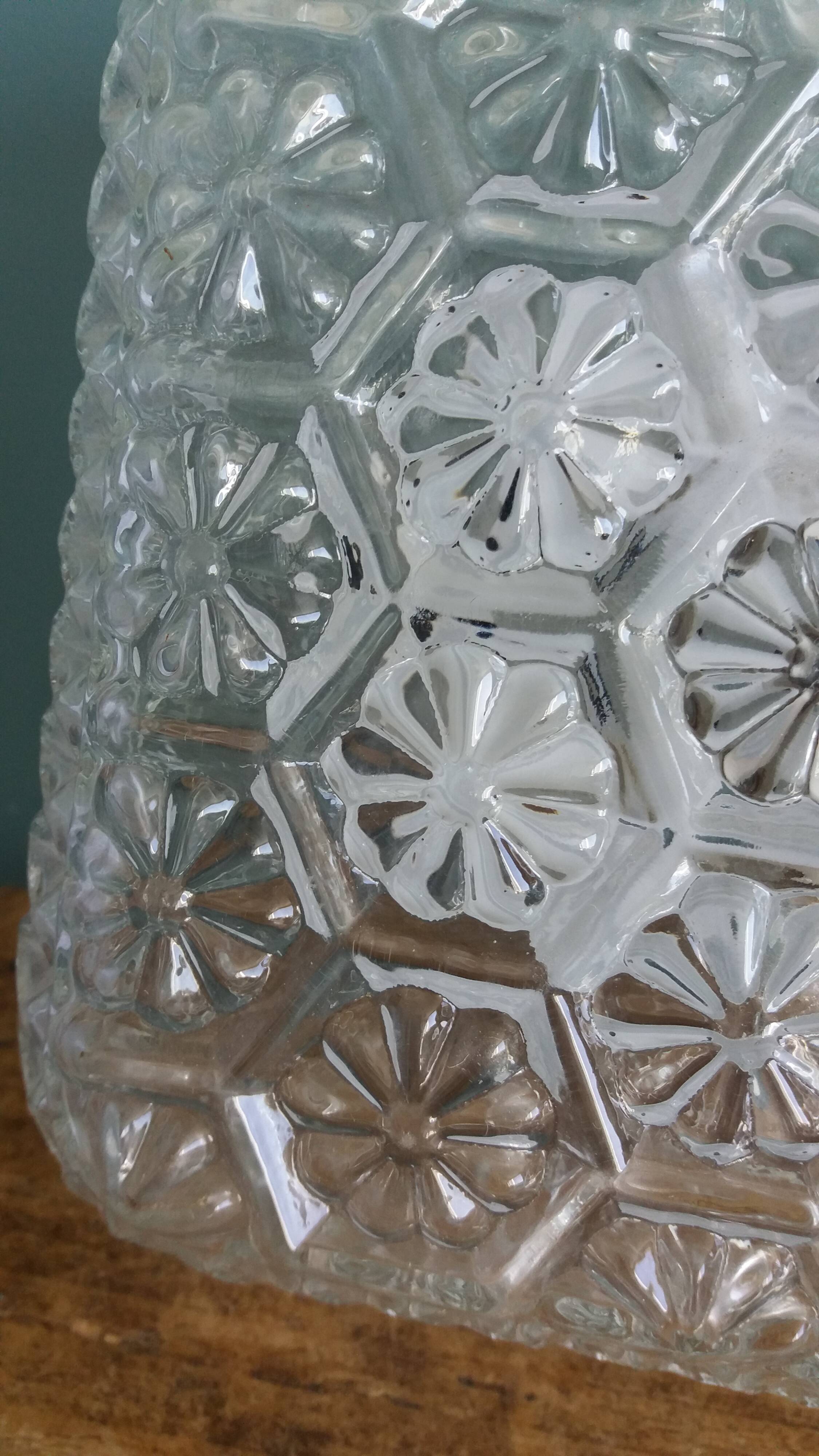Square globe ceiling light in moulded glass.