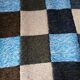 Hand knitted patchwork plaid