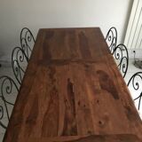 Wrought iron table with wooden top and 6 chairs