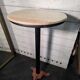 Bistro standing table with marble top and cast iron base.