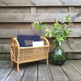 Old rattan magazine rack