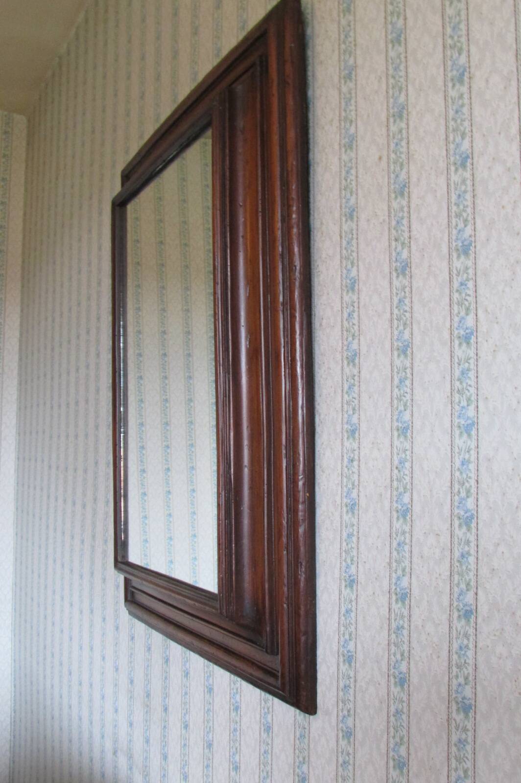 Large mirror in natural stained wood