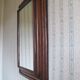 Large mirror in natural stained wood