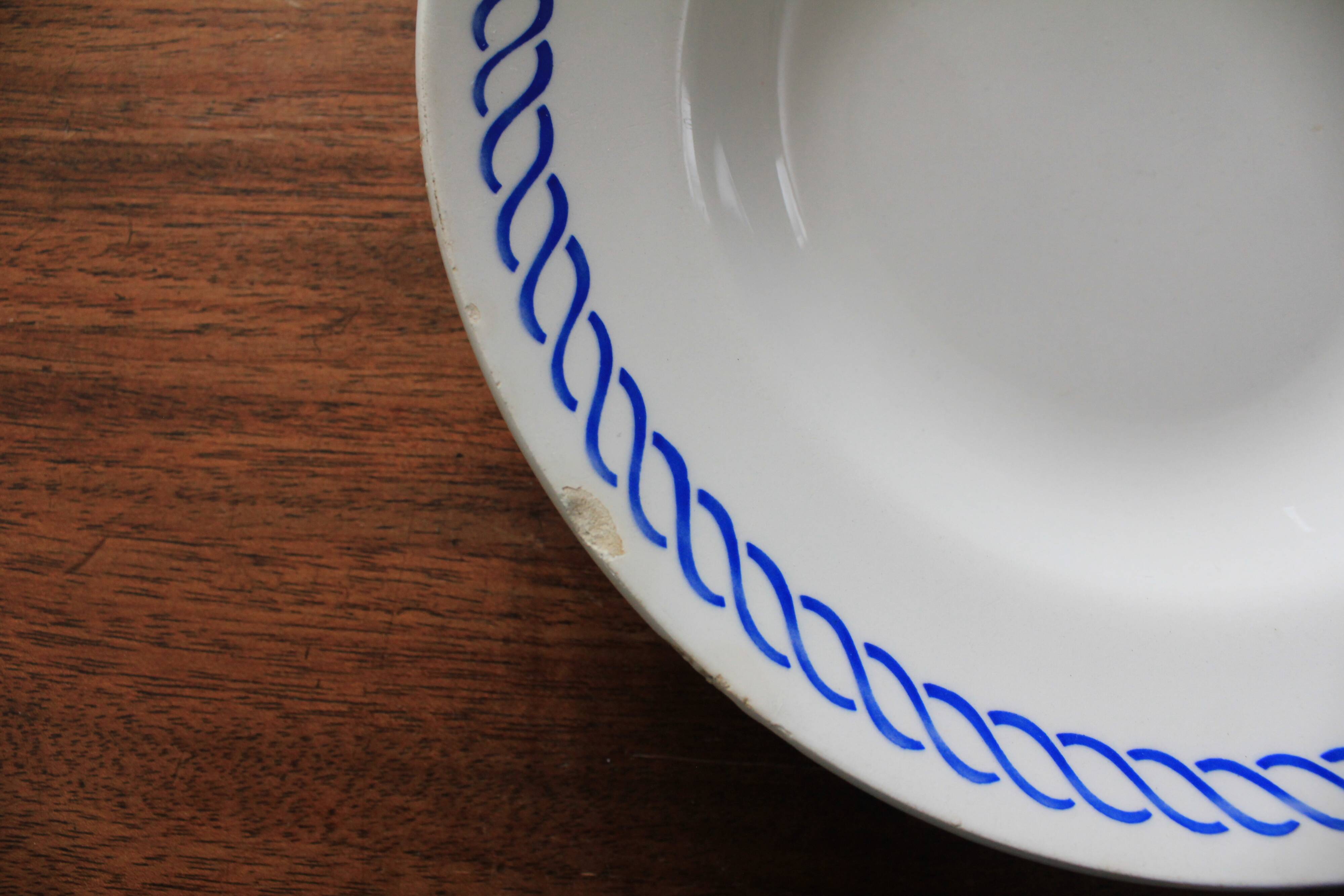 Deep plate with royal blue geometric pattern marked on the back FB 45.