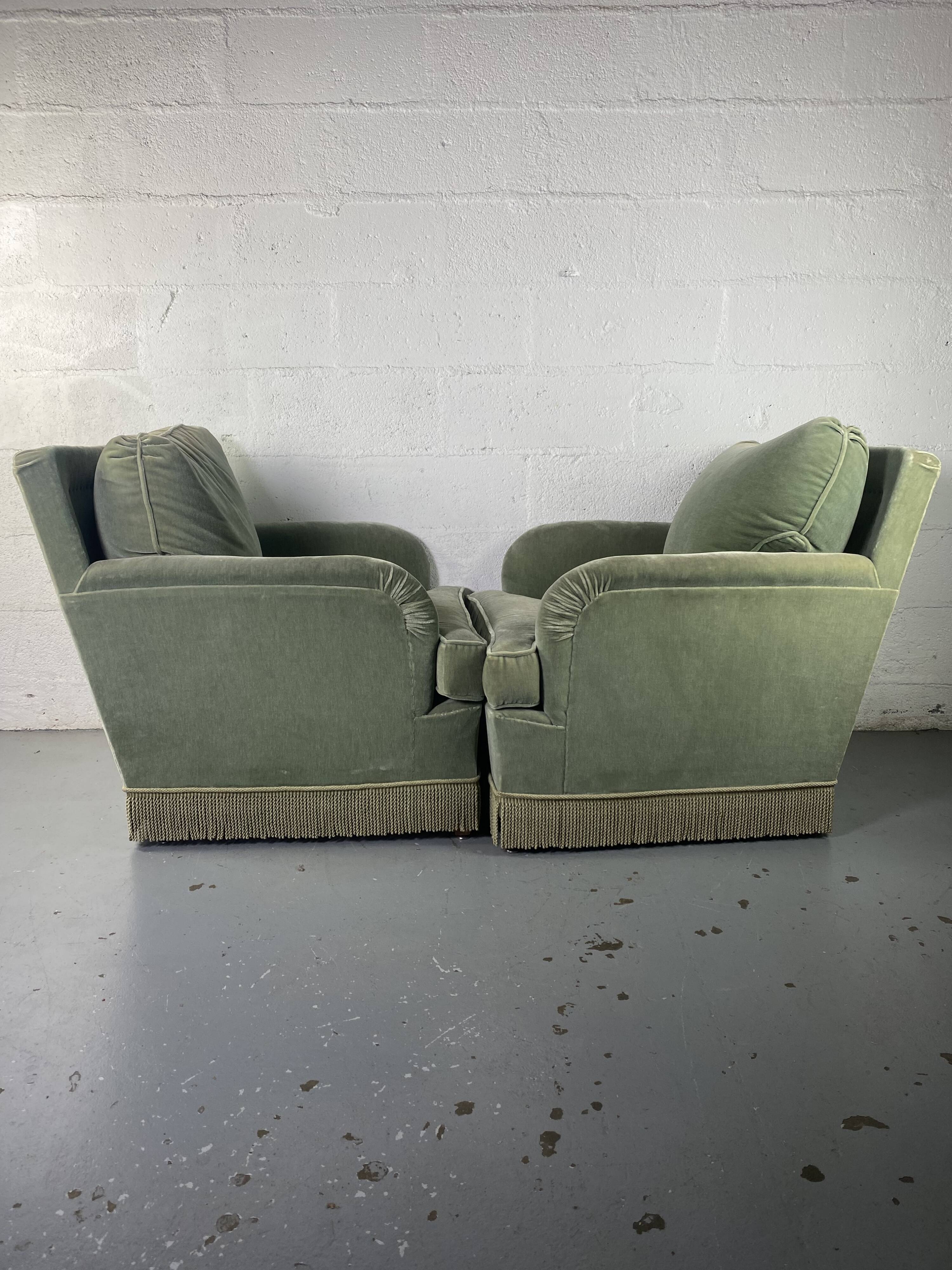 Pair of green velvet club armchairs